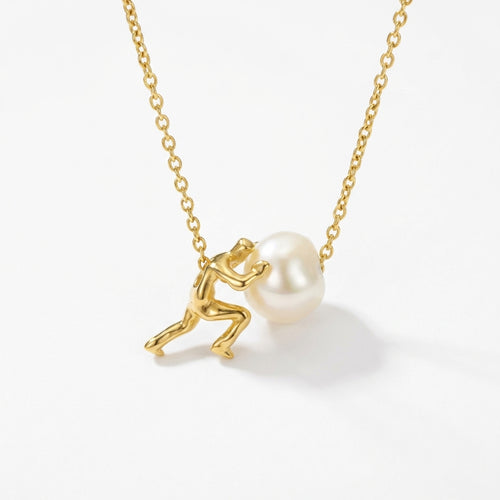 Sisyphus necklace with a gold finish, showcasing a natural pearl and minimalist design