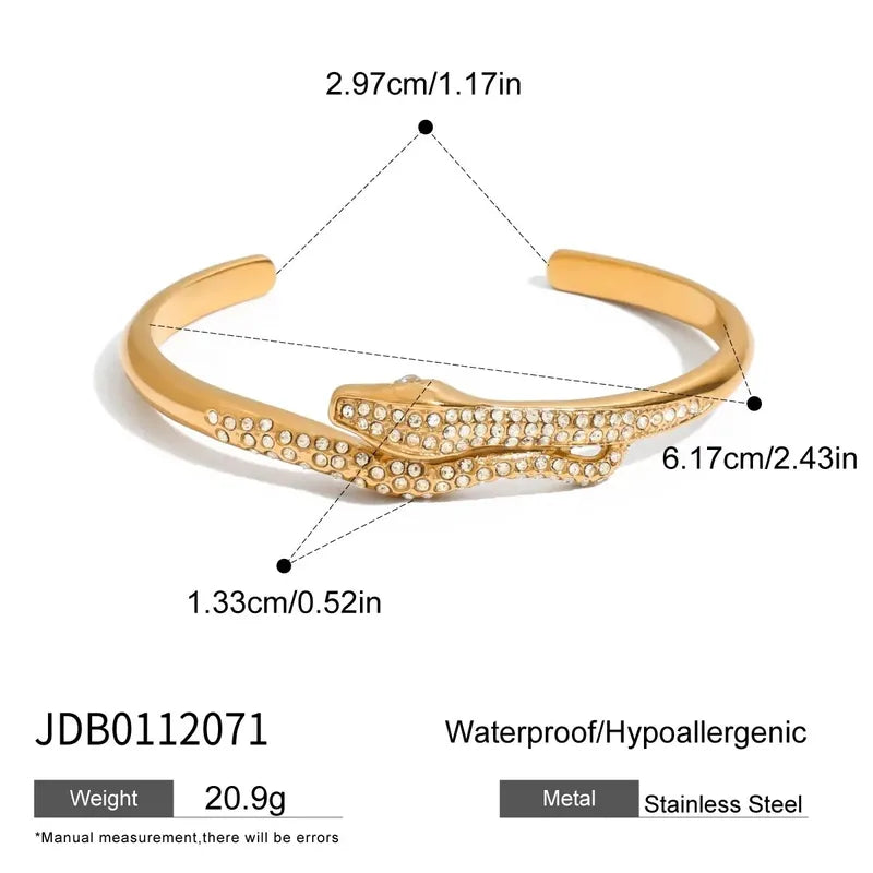 Gold cuff bracelet with twisted silhouette, contemporary jewellery
