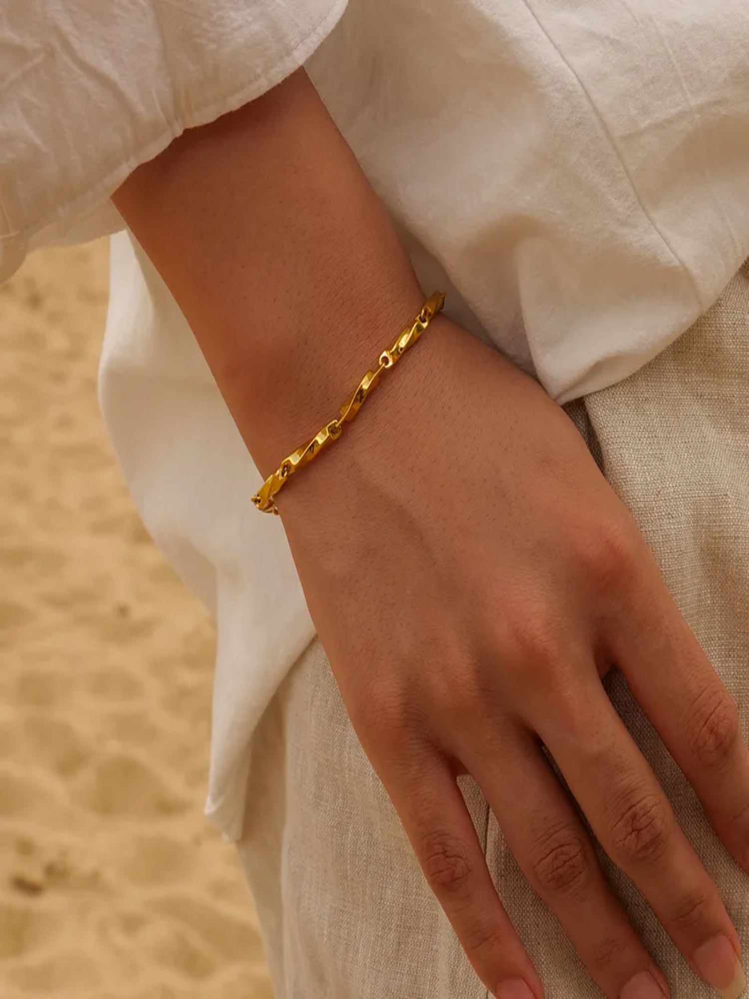 Minimal gold twist bracelet, refined modern design