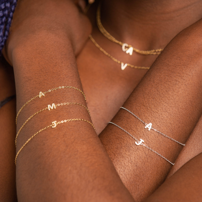 Close-up of sapphire letter bracelet detail