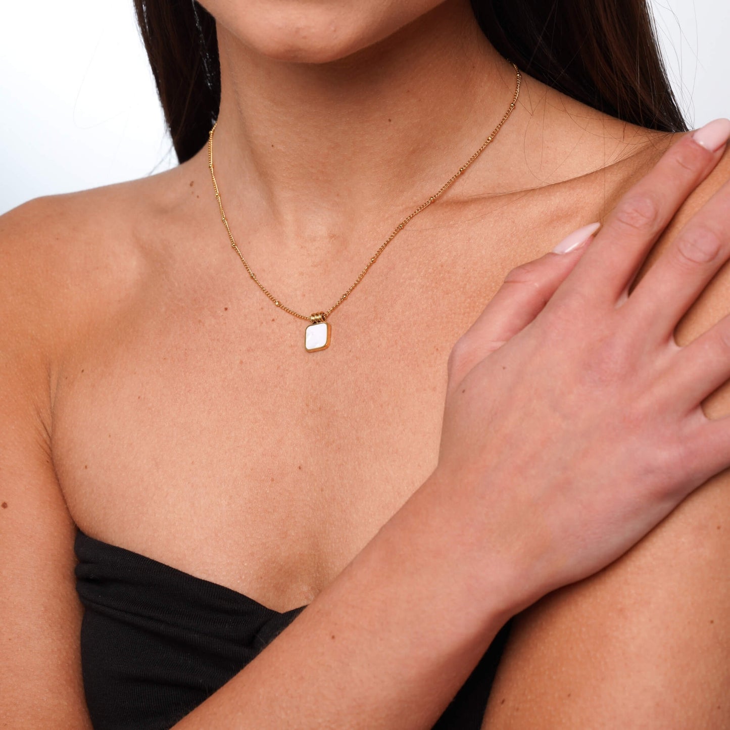 Close-up of luminous pearl pendant detail