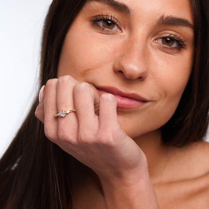 Nicole ring styled on a feminine hand