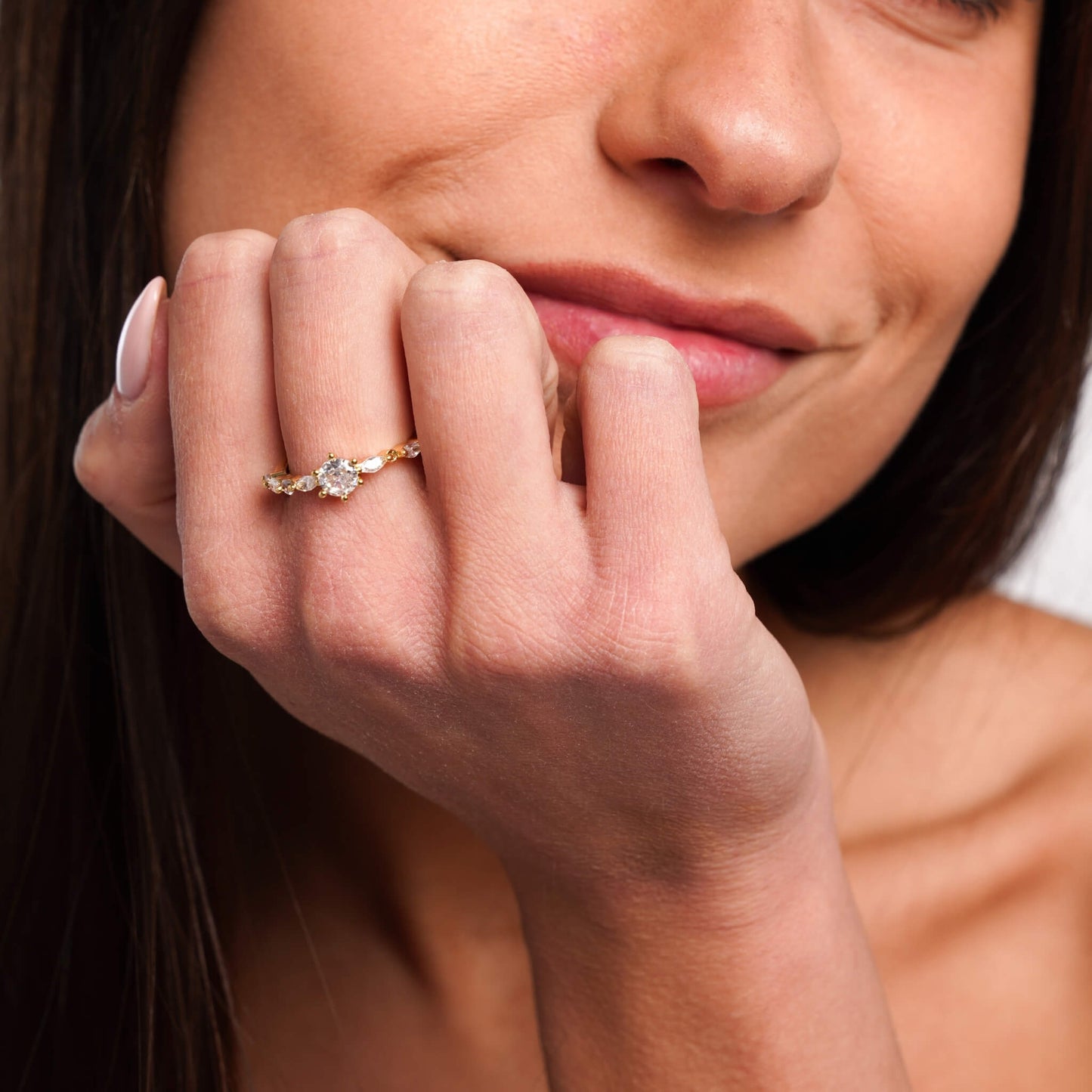 Close-up of gold Nicole ring with stone