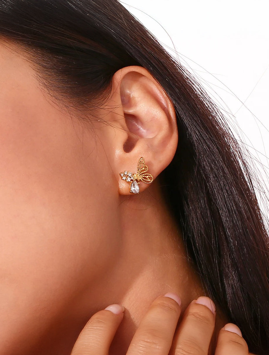 Gold butterfly stud earrings, delicate feminine design
