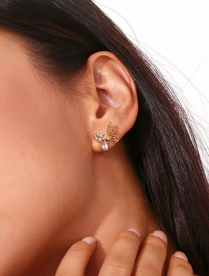 Gold butterfly stud earrings, delicate feminine design