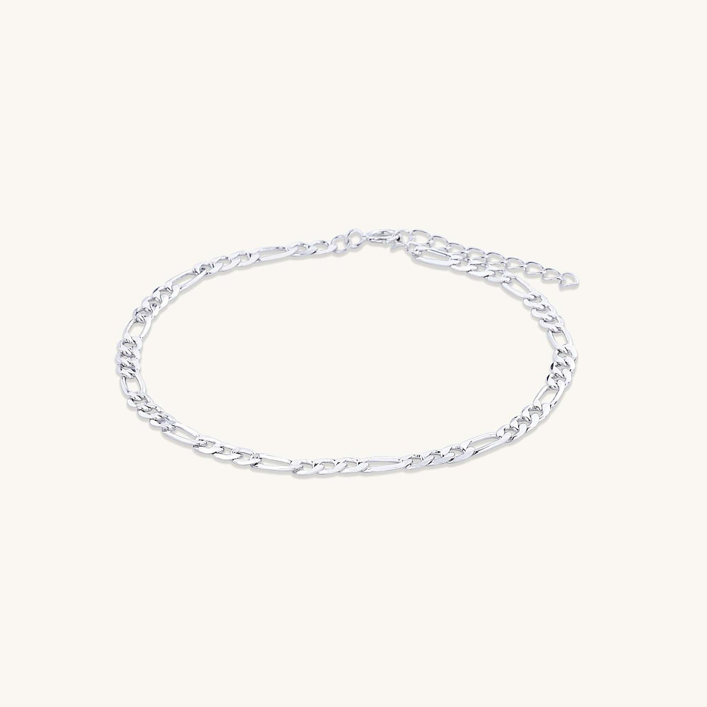 Classic figaro bracelet shown with elegant outfit