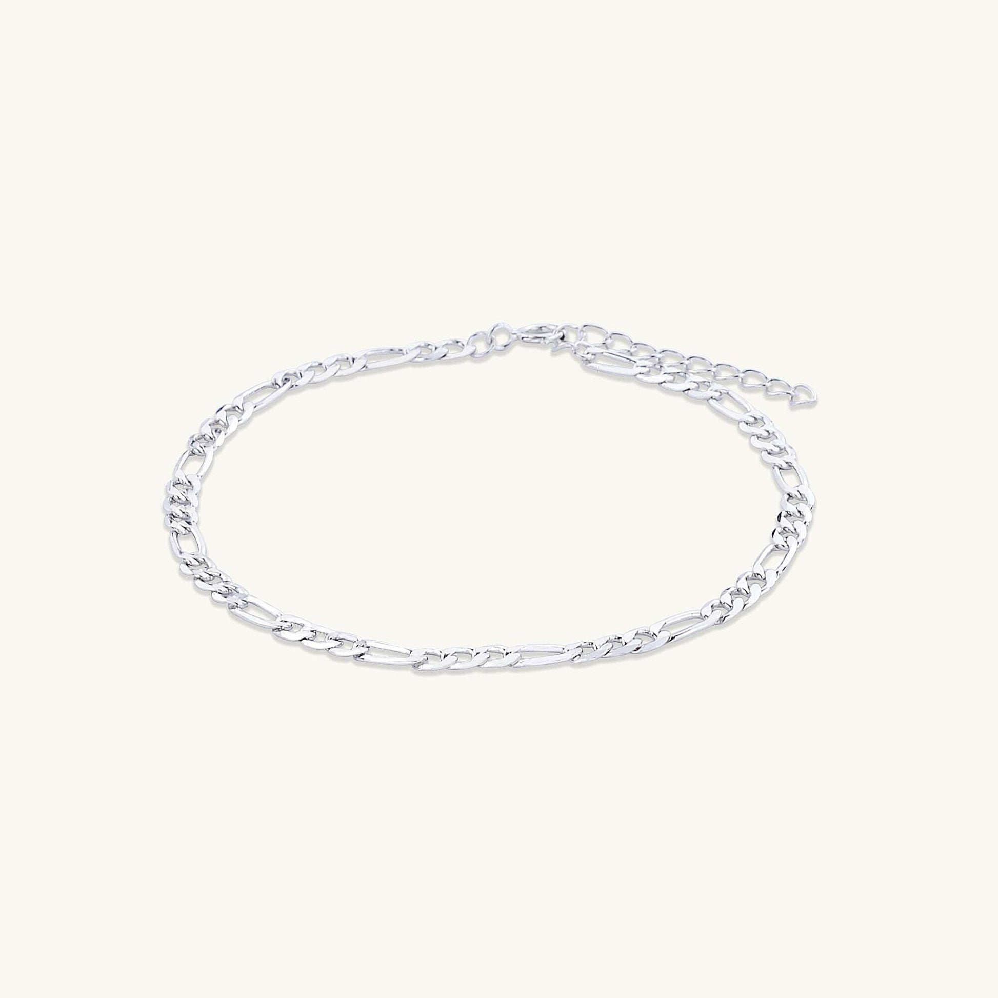 Classic figaro bracelet shown with elegant outfit