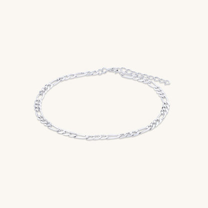Classic figaro bracelet shown with elegant outfit