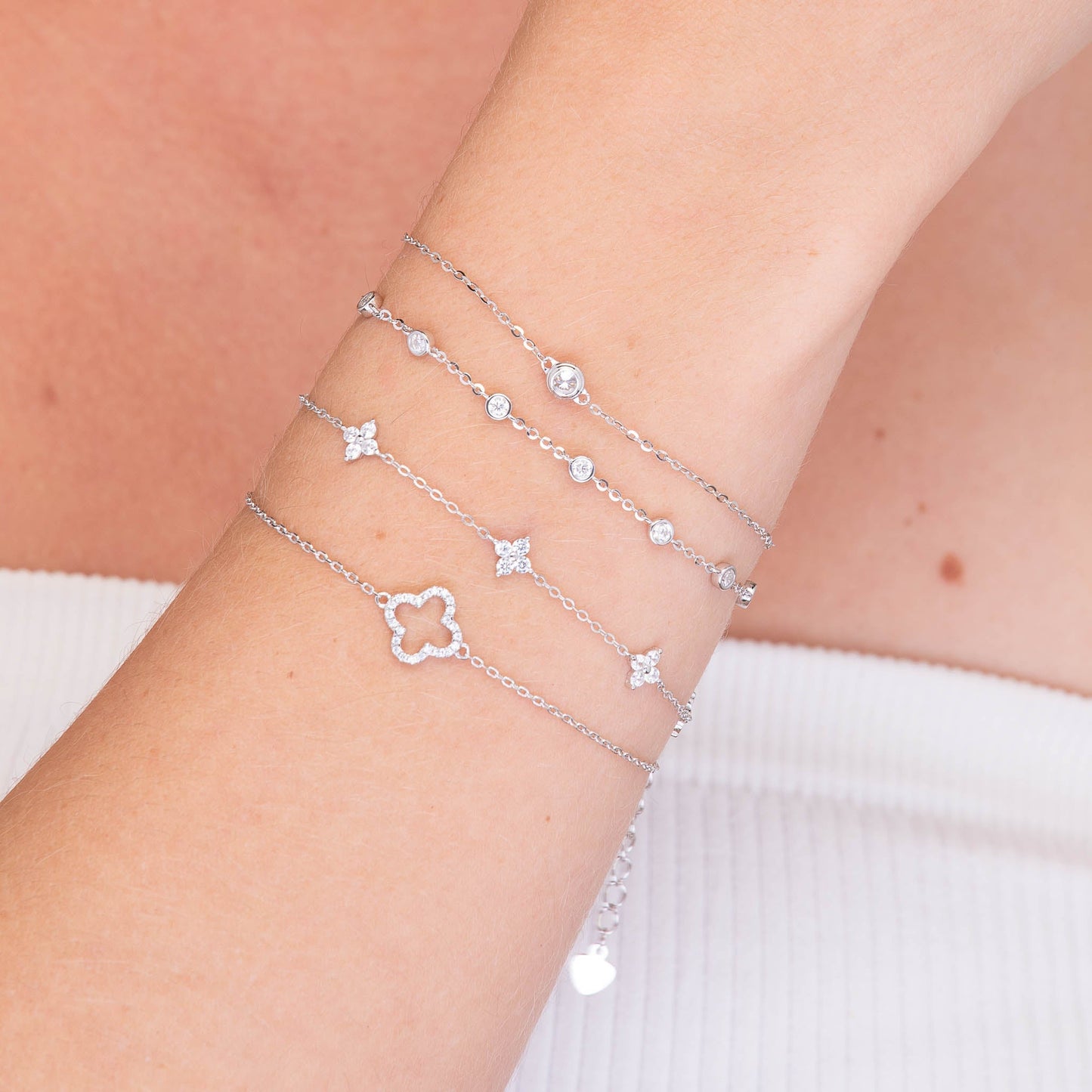 Gold clover bracelet, side angle view