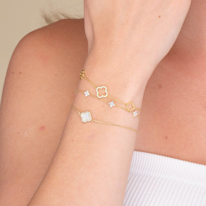Clover station bracelet styled on a feminine wrist