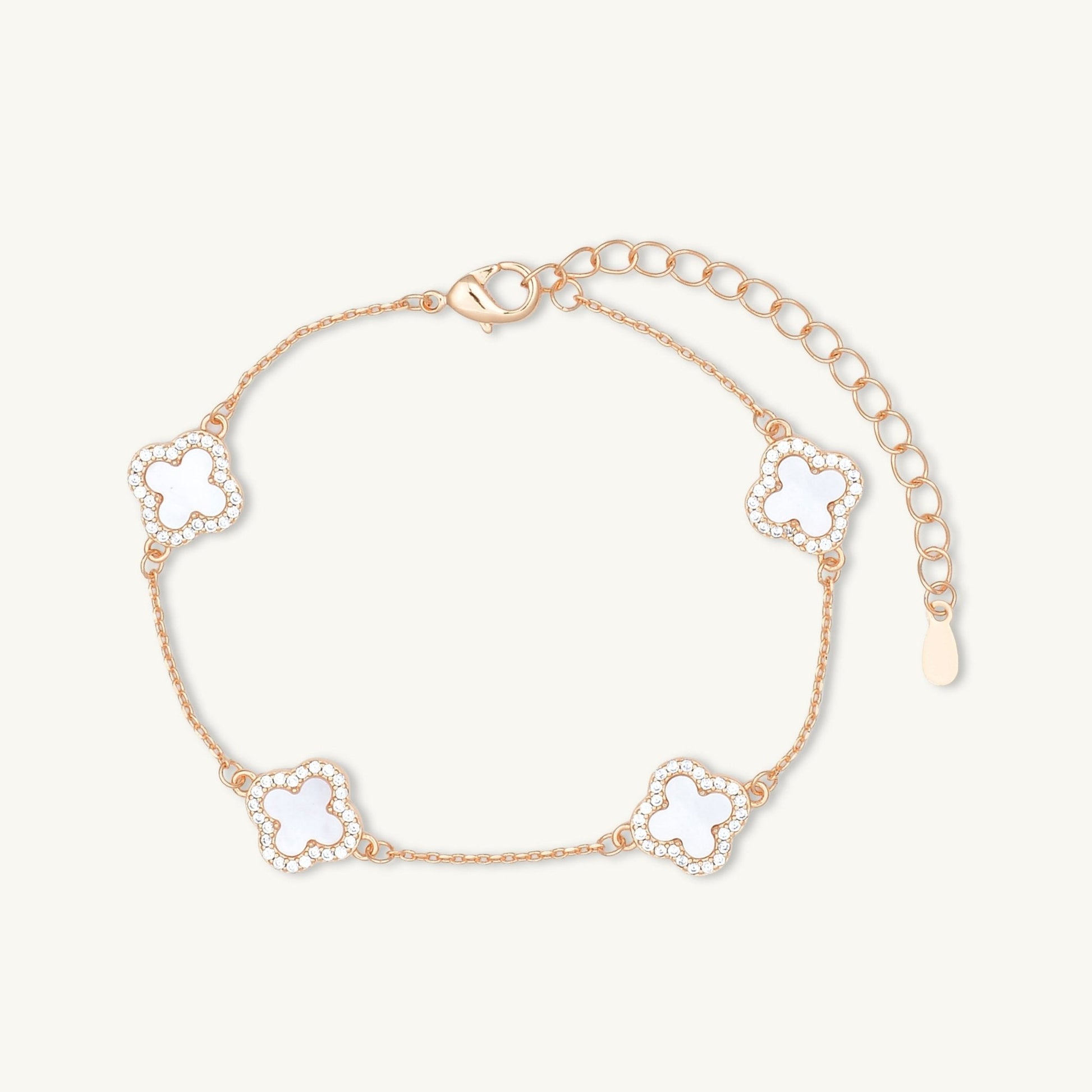 Mother-of-pearl clover bracelet on neutral background