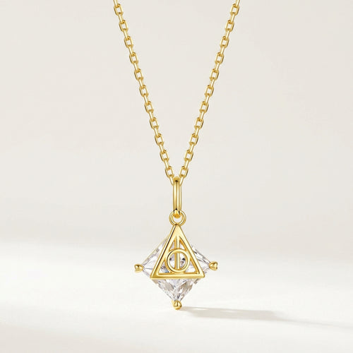 Deathly Hallows sterling silver necklace with gold triangular pendant and clear faceted crystal
