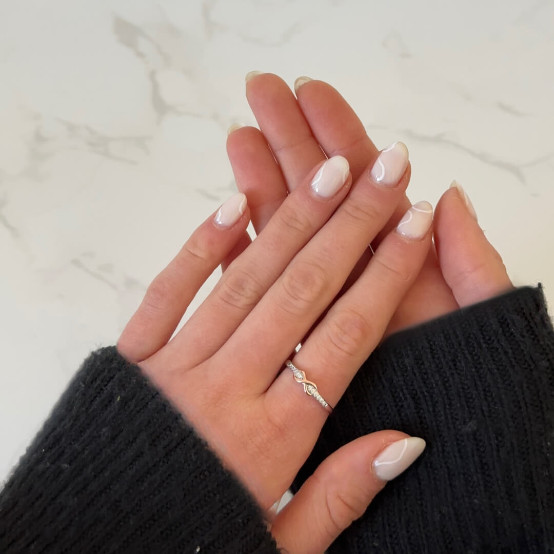 Close-up of gold eternal love ring detail