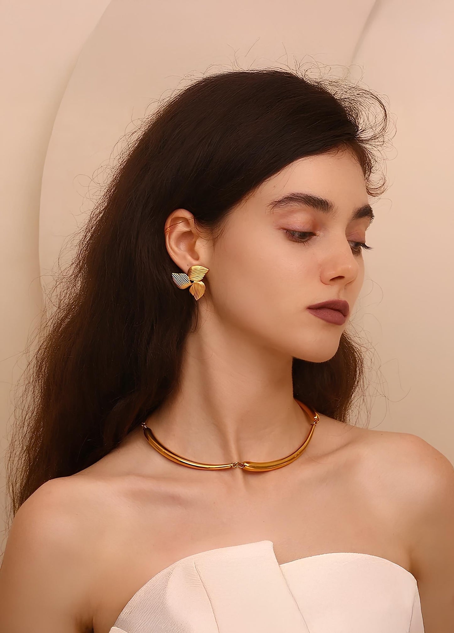 Gold floral cluster earrings with three flower detail