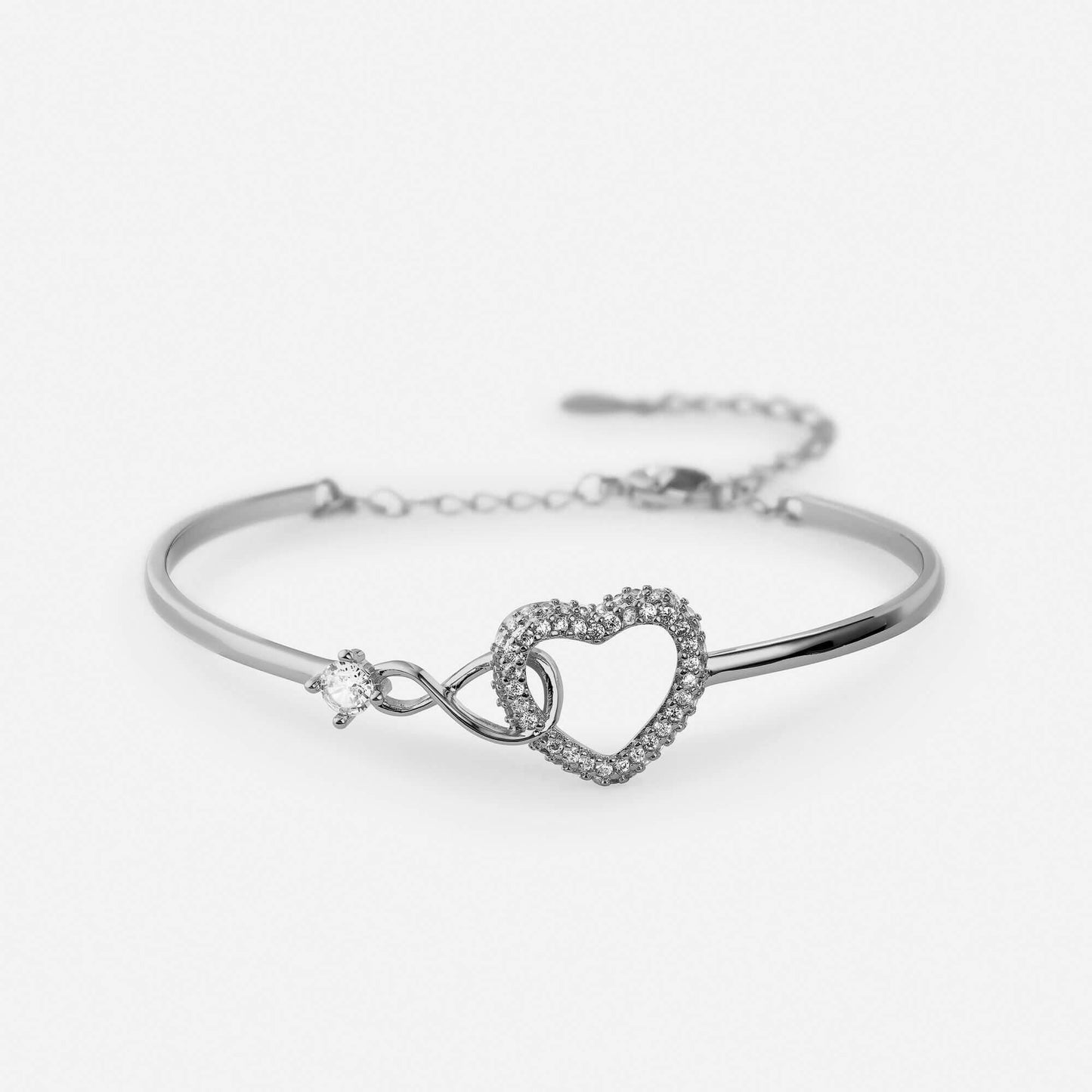 Sterling silver infinity and heart charm bracelet with adjustable fit