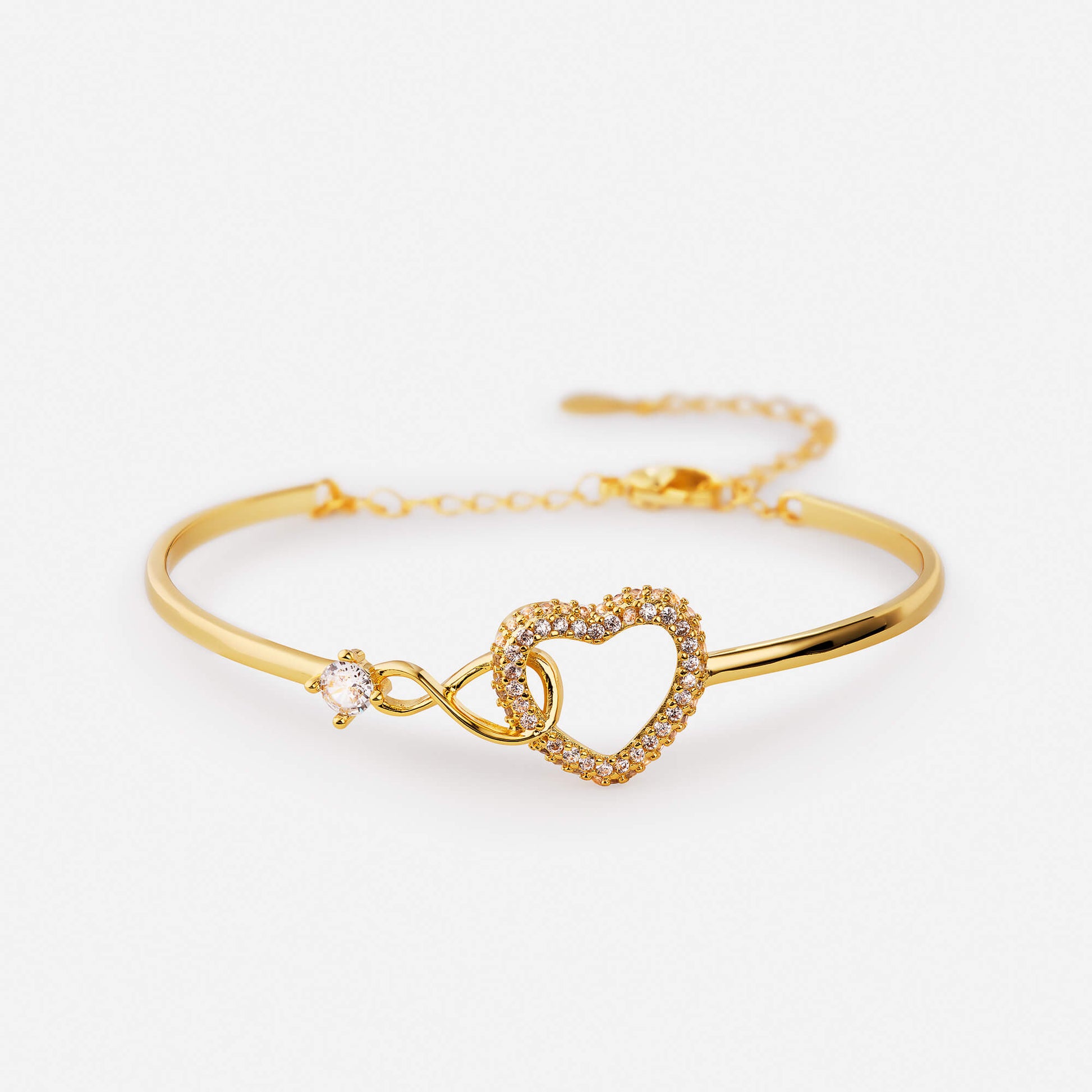 Gold infinity and heart charm bracelet, symbolic delicate jewellery