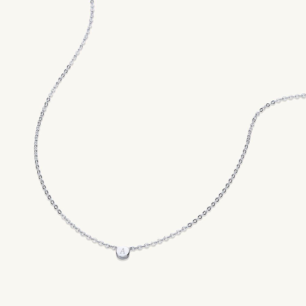 Initial dot necklace lifestyle layered styling