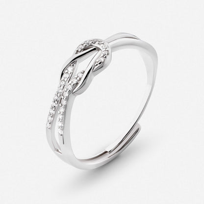 Gold knot ring, side angle view
