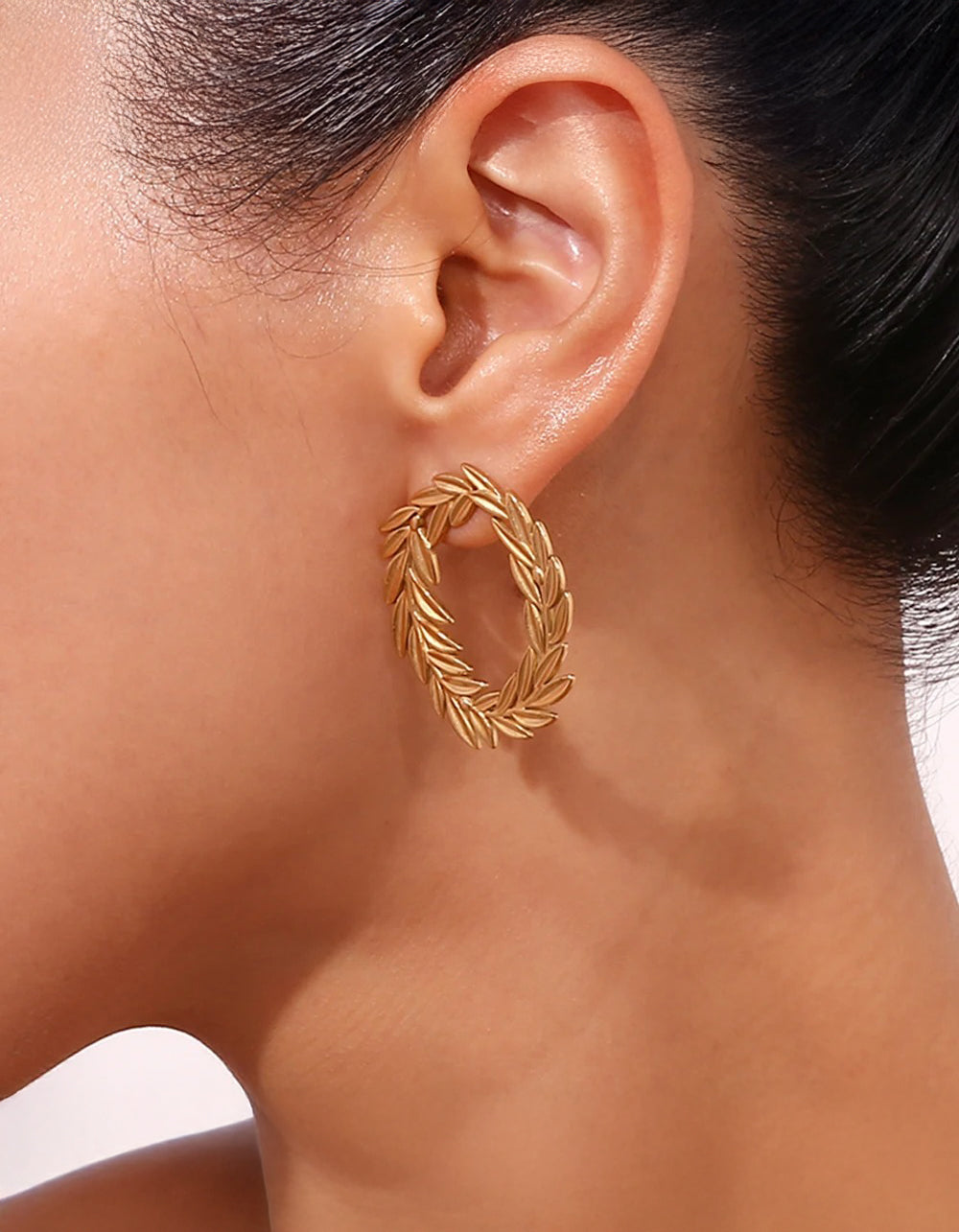 Ravyena Laureled Empress earrings styled on model