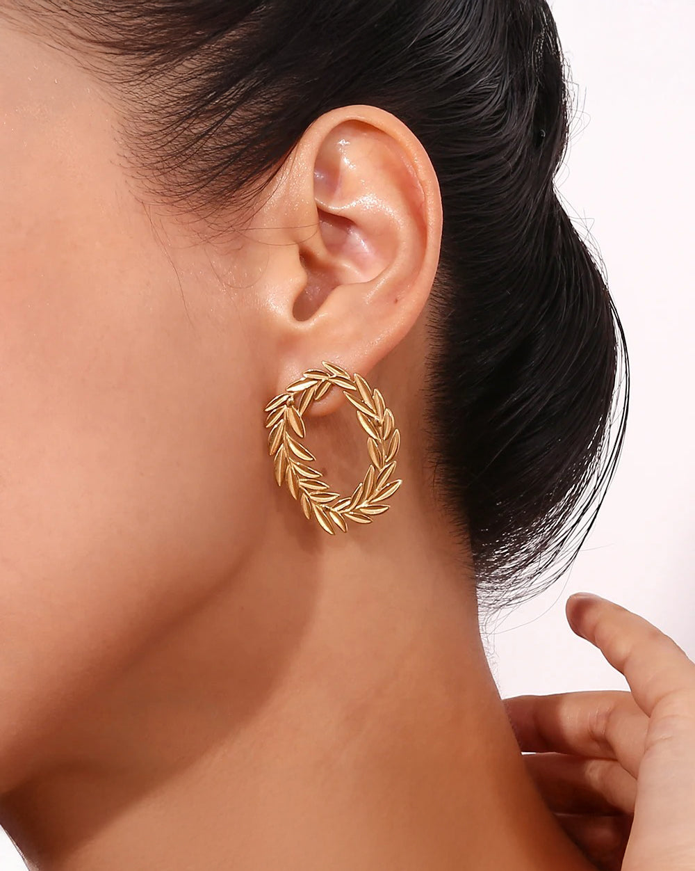Gold laurel leaf hoop earrings – close-up detail