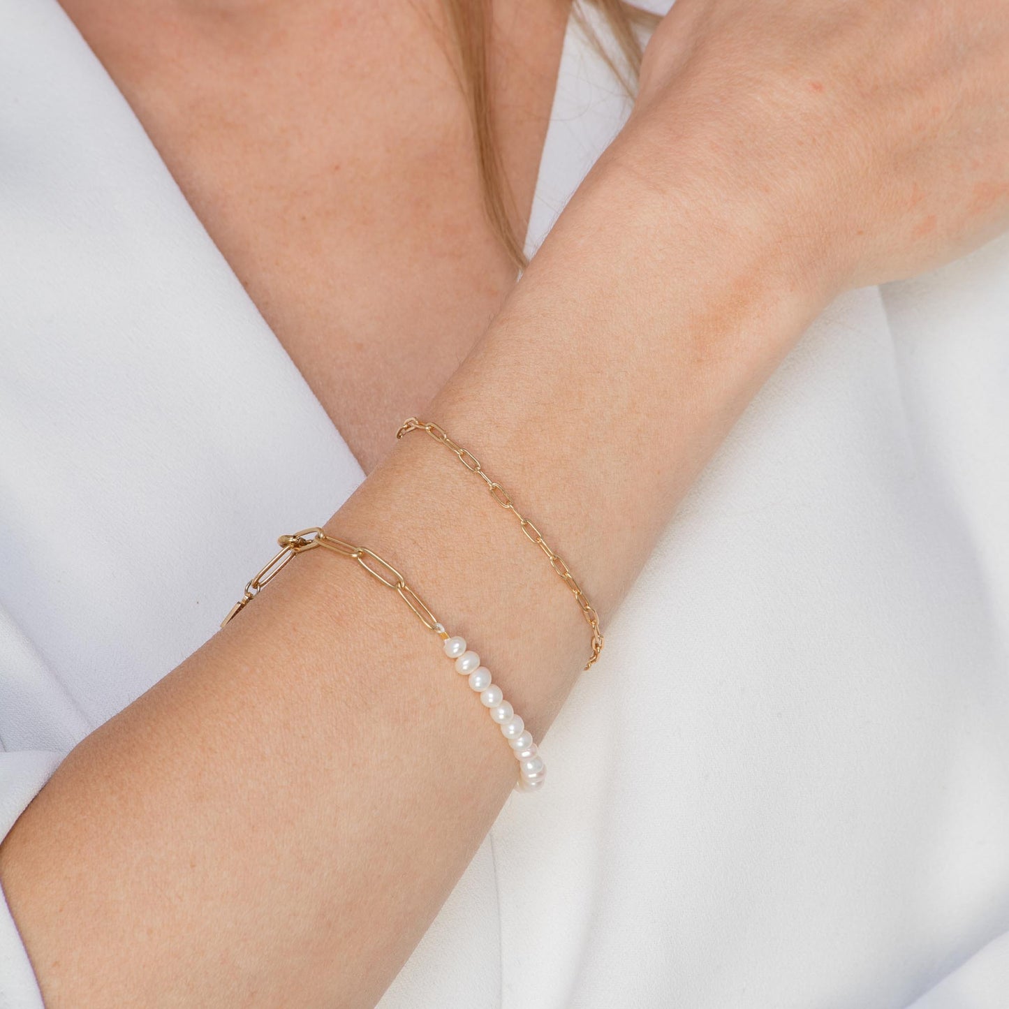 Close-up of gold link chain bracelet detail