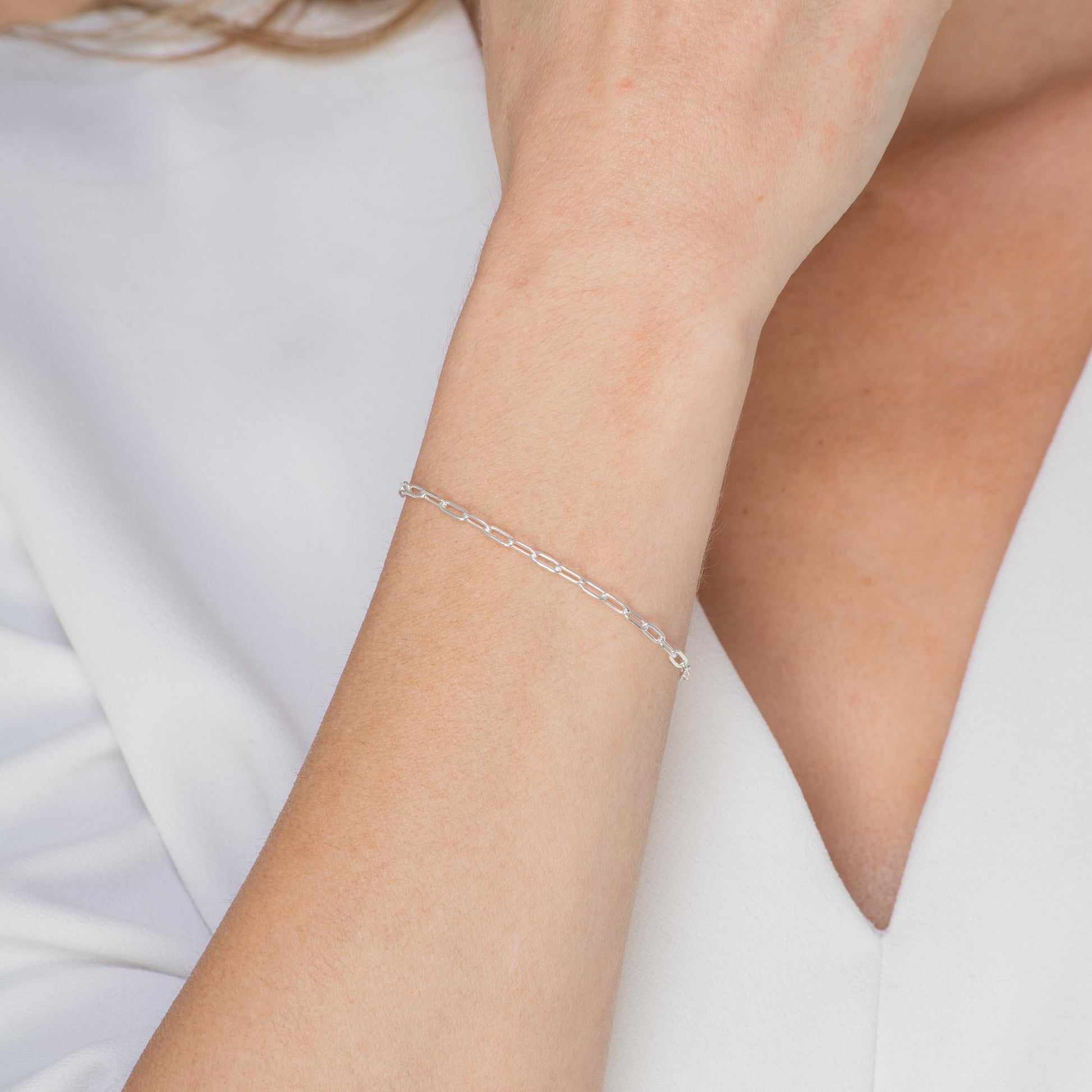 Gold chain bracelet, side angle view