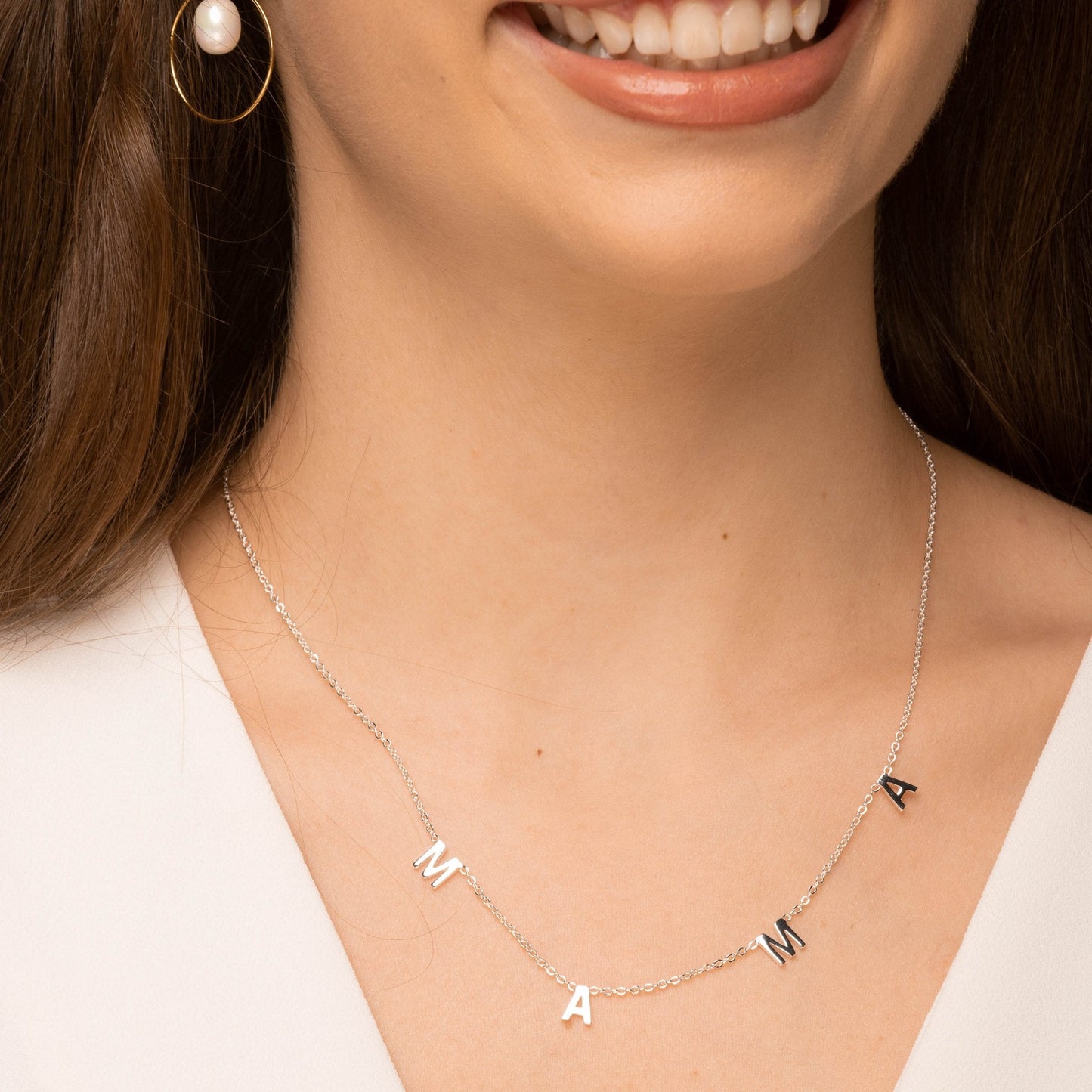 Gold vermeil Mama necklace, side angle view