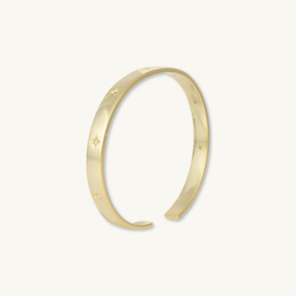 Gold star bangle, refined feminine design