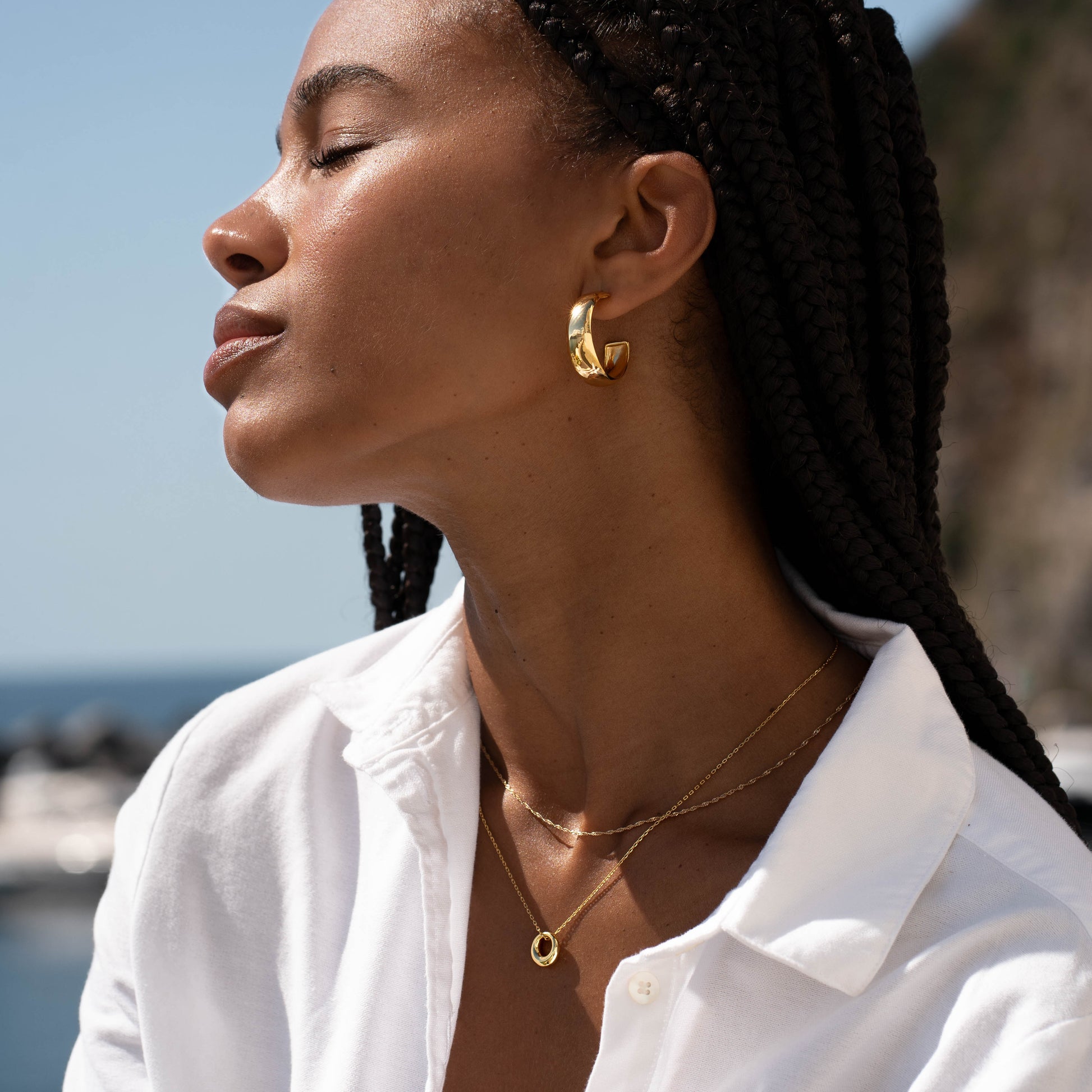 18K gold vermeil circle pendant necklace, side angle view