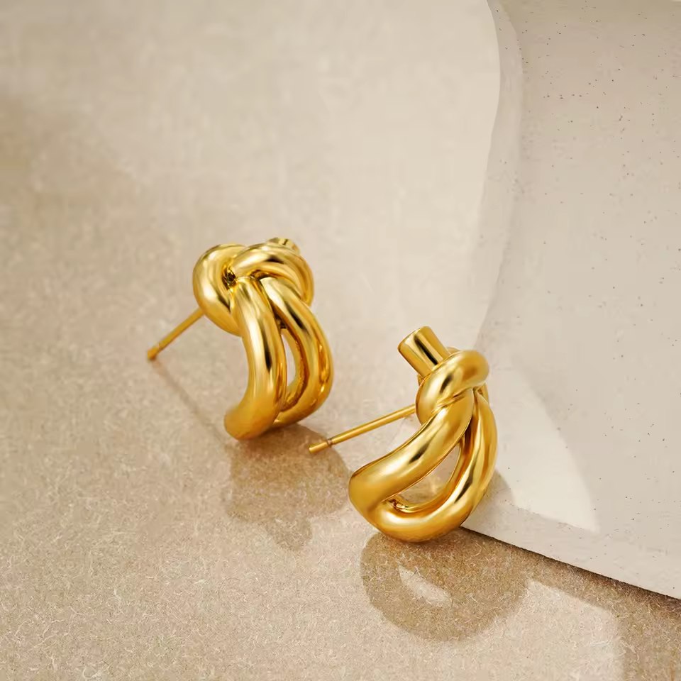 Sterling silver knot huggie hoops, modern jewellery