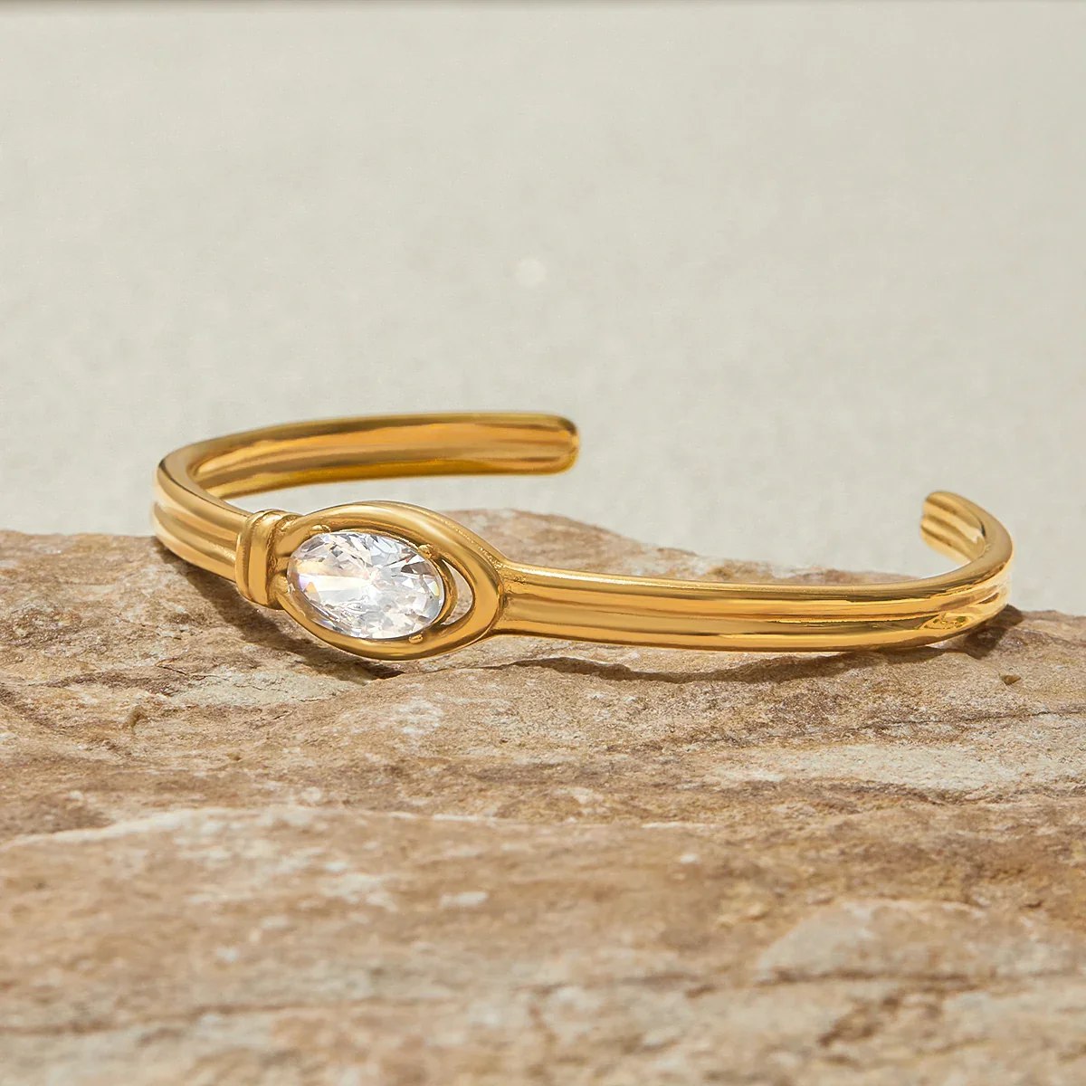 Oval crystal gold cuff bracelet detail shot
