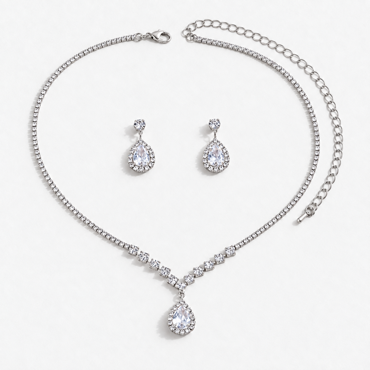 Crystal Teardrop Necklace & Earring Set in Silver / Clear, product view on a white background - Ravyena