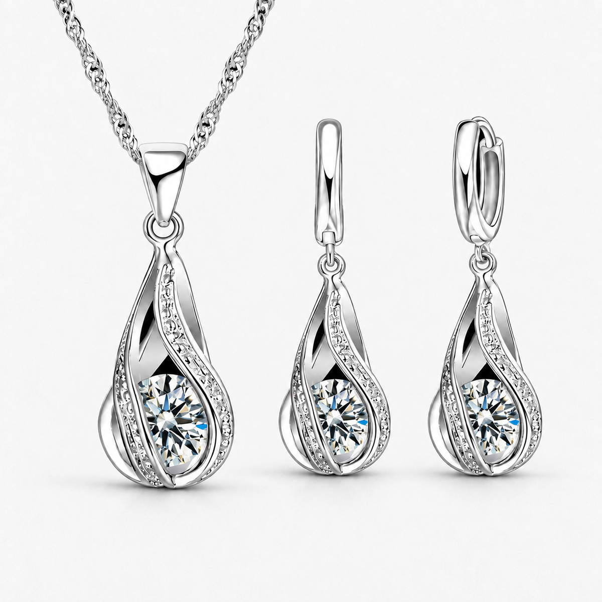 Twist Teardrop Crystal Necklace & Earring Set in Clear, product view on a white background - Ravyena
