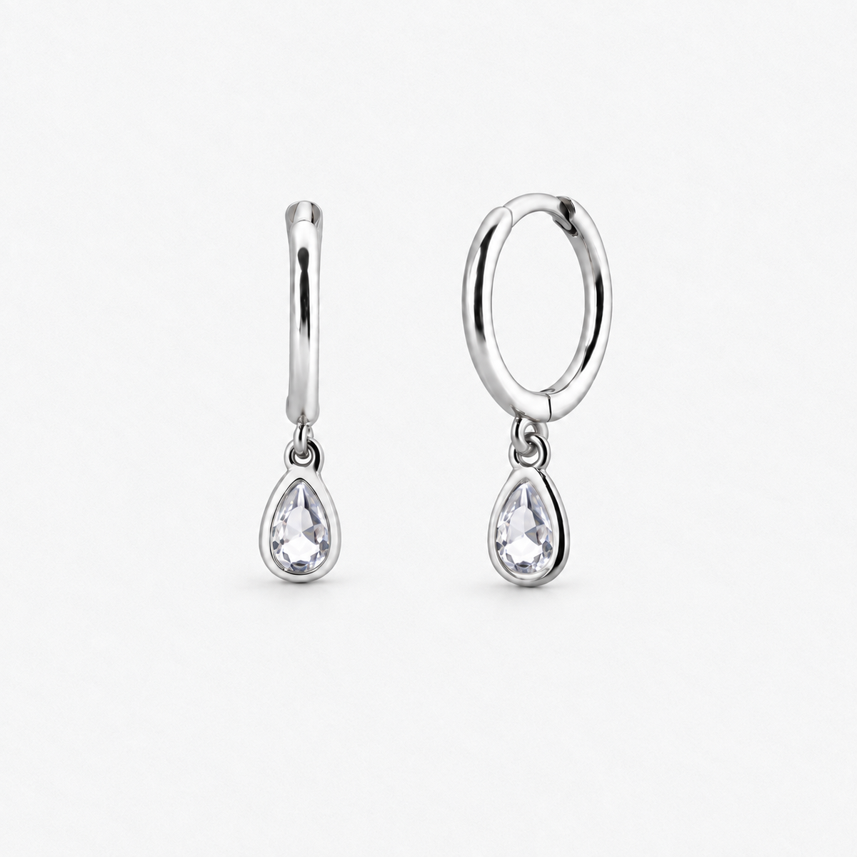 Dainty Teardrop Crystal Hoop Earrings in Silver, product view on a white background - Ravyena