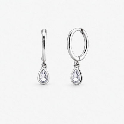 Dainty Teardrop Crystal Hoop Earrings in Silver, product view on a white background - Ravyena