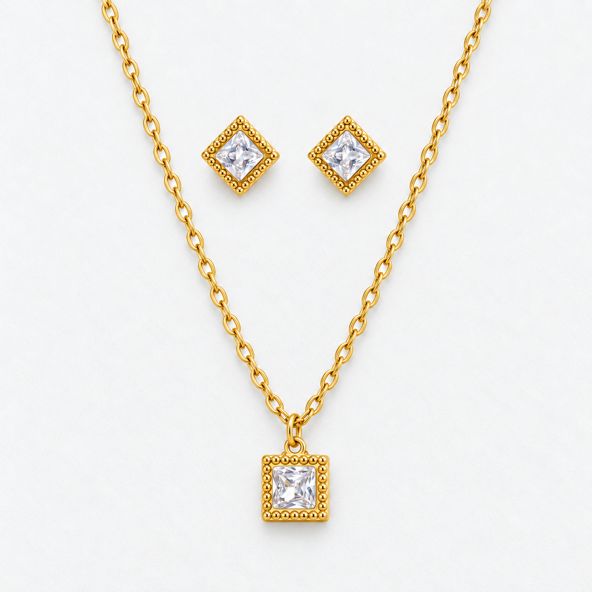 Gold Square Crystal Necklace & Stud Earring Set in Gold, product view on a white background - Ravyena