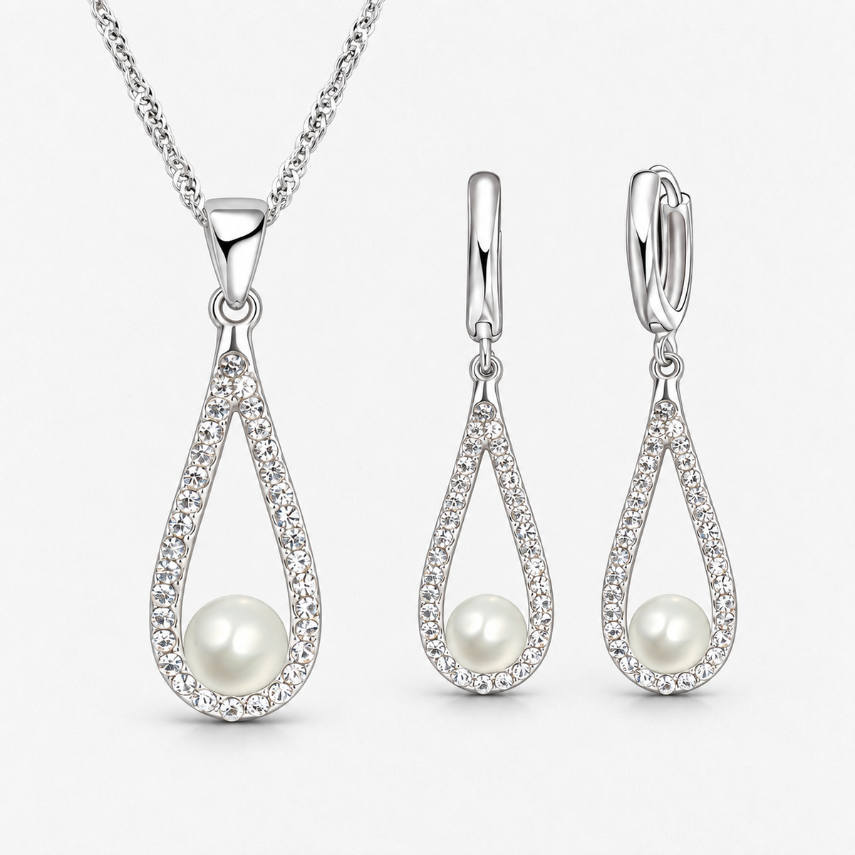 Pearl Teardrop Necklace & Earring Set in Silver, product view on a white background - Ravyena