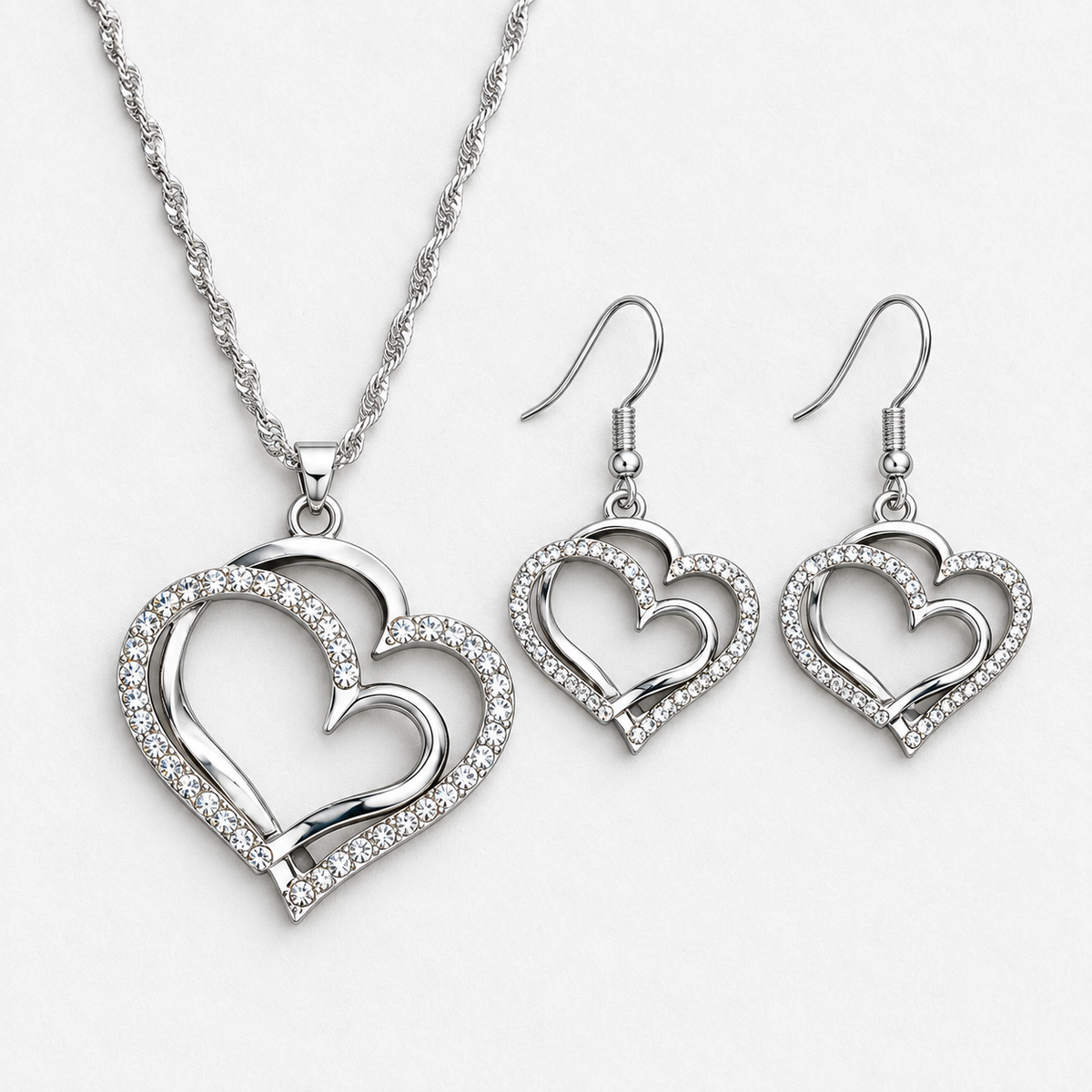 Double Heart Crystal Necklace & Earring Set in Silver, product view on a white background - Ravyena