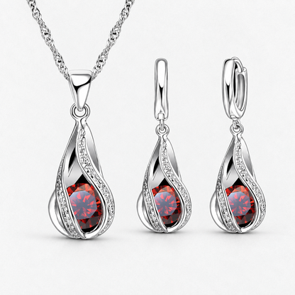Twist Teardrop Crystal Necklace & Earring Set in Red, product view on a white background - Ravyena