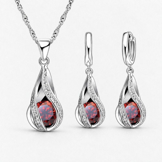 Twist Teardrop Crystal Necklace & Earring Set in Red, product view on a white background - Ravyena