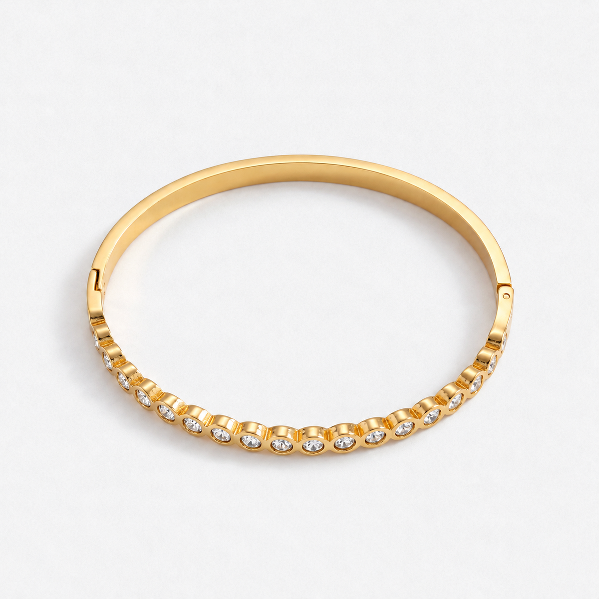 Chunky Solitaire Tennis 14K Gold Bangle in gold, product detail on a neutral white background