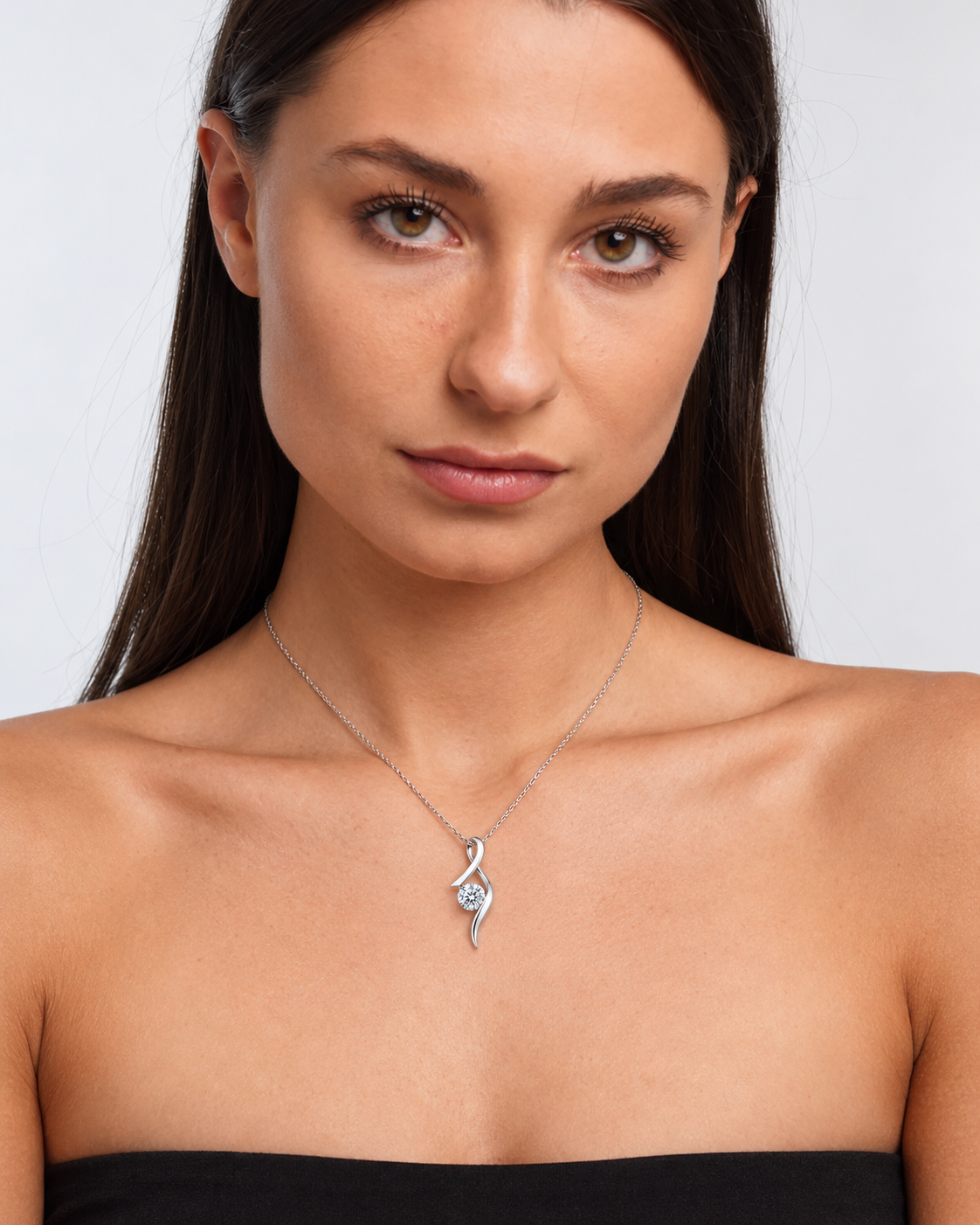 Sterling Silver Cubic Zirconia Solitaire Pendant Necklace in silver worn by a model, portrait