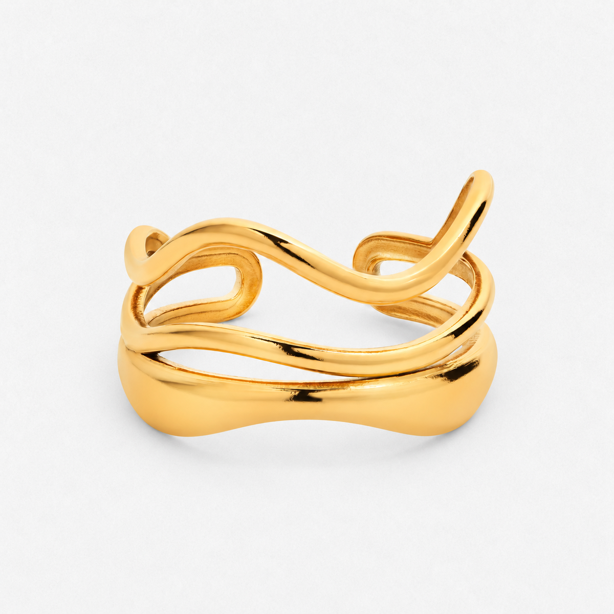 Tyra gold-coloured sculptural ring photographed alone on the approved off-white background
