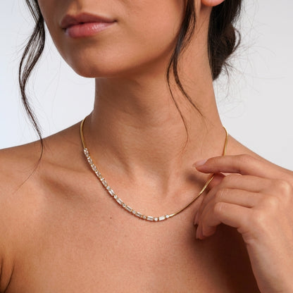 Half tennis necklace with continuous row of sparkling crystals