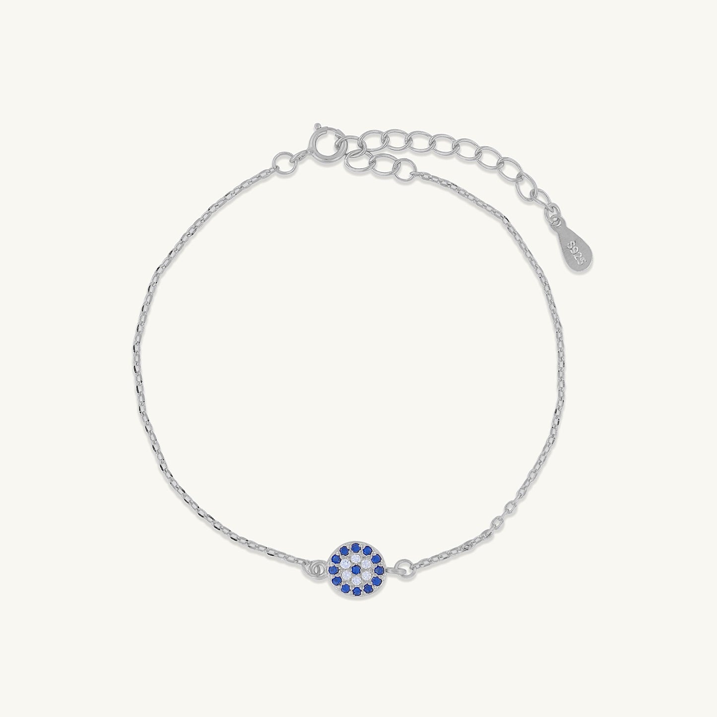 Close-up of pave evil eye charm detail