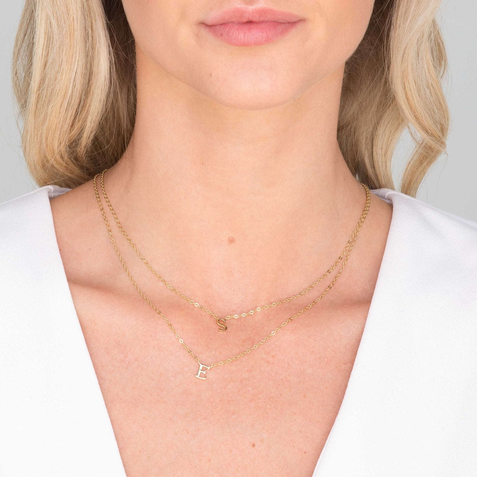 Script letter pendant variation F in gold vermeil