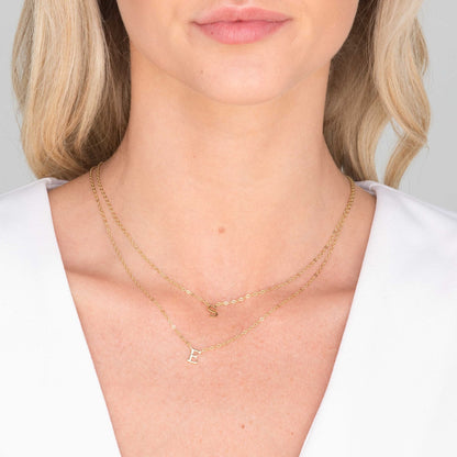 Script letter pendant variation F in gold vermeil