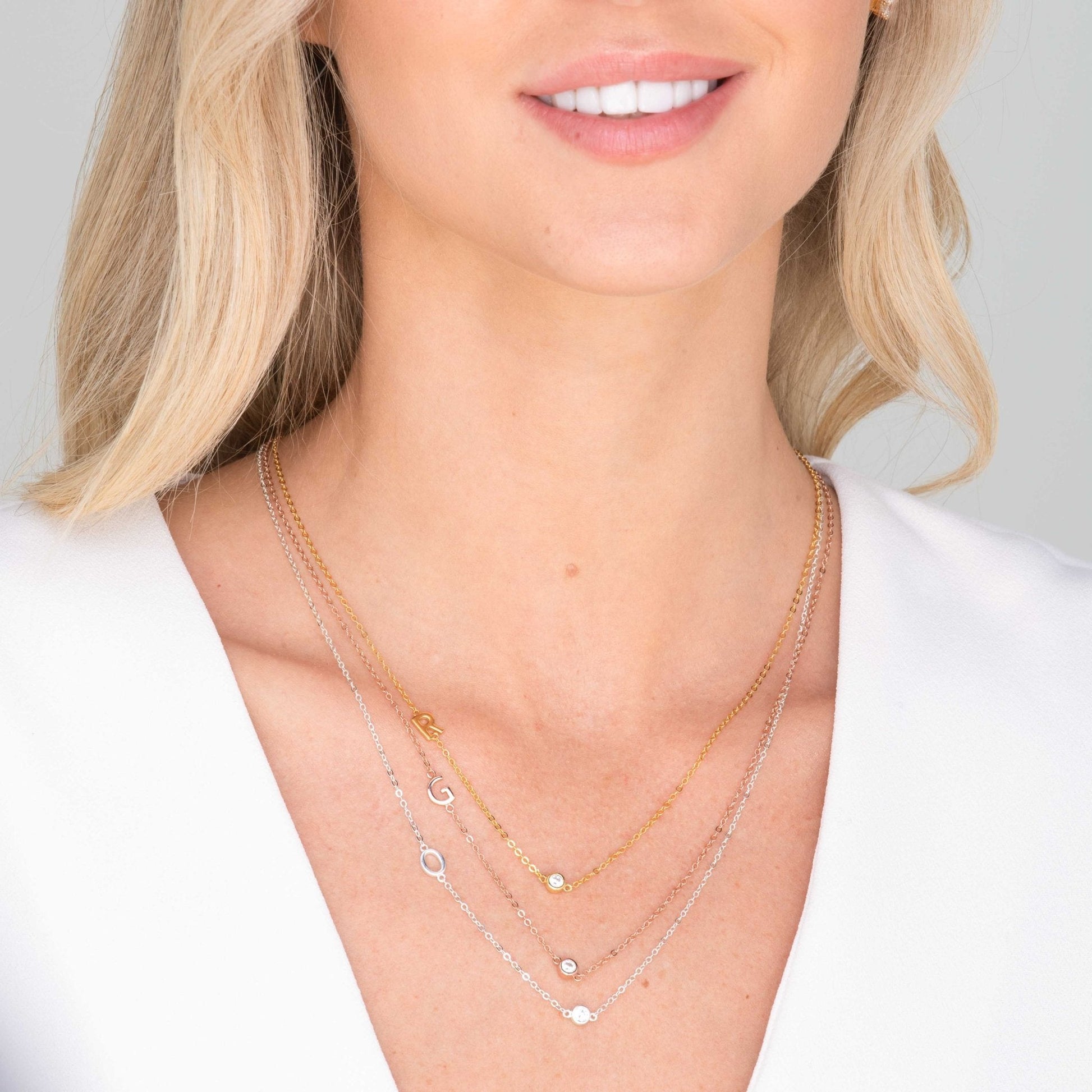 Personalised pavé letter pendant on delicate gold chain