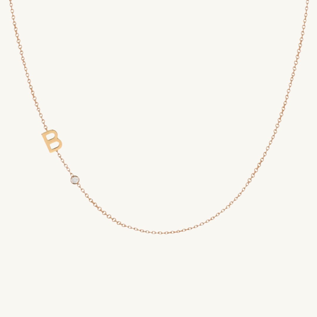 Pavé letter pendant in gift presentation packaging