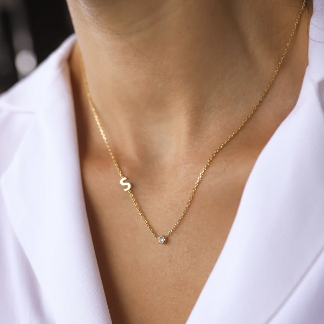 Sideways pavé letter necklace, alphabet variation D